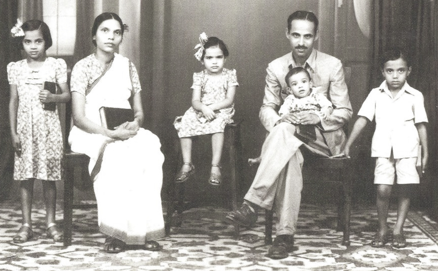 Sam's Family (he is standing next to his father)